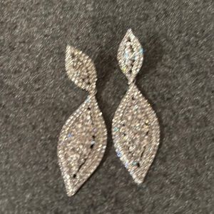 Silver and Rhinestone earrings. NEVER BEEN WORN! Includes box and storage bag.
